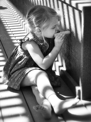 Child playing with chalk